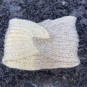 Hand knitted ear warmer.
